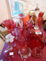 A quantity of cranberry glassware including vases, bell, etc. - various condition