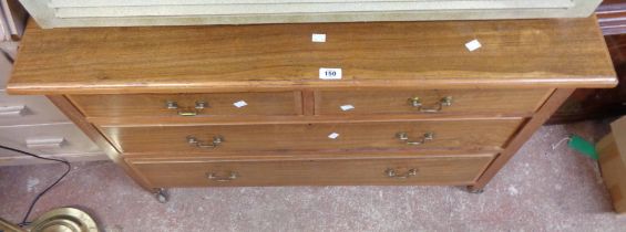 A 1.07m 20th Century walnut and strung chest of two short and two long drawers, set on casters