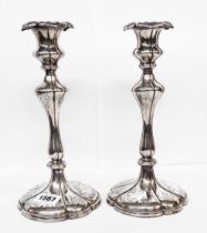A pair of 26.5cm antique Elkington & Co silver plated candlesticks with detachable nozzles, engraved