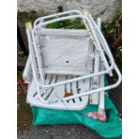 A pair of modern plastic folding garden chairs - sold with another