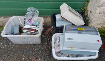 Three crates containing a quantity of assorted electrical fittings including fuse boxes, etc.