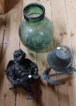 A small green glass carboy - sold with a vintage cast brass 'Graf Spee' porch bell and a resin