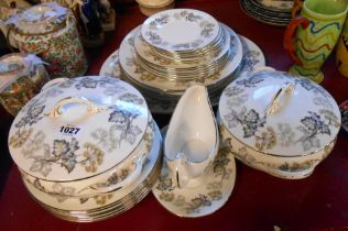 A quantity of Coalport bone china dinner ware decorated in the Camelot pattern including tureens,