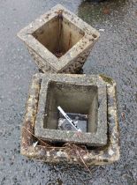 Three small similar concrete planters of square tapered form