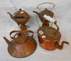 A Victorian copper kettle with milk glass handle, a 'barge' type copper kettle and two copper and