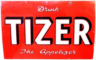 An original Tizer enamel advertising sign 'Drink Tizer the Appetizer' in white on a red ground