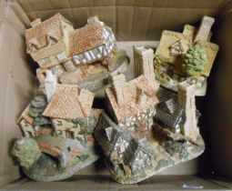 A box containing four David Winter cottages