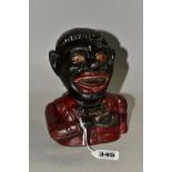 A CAST IRON JOLLY GENTLEMAN MONEY BOX/BANK, height 15.5cm, with working arm mechanism (1) (Condition
