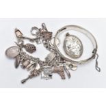 A SELECTION OF SILVER AND WHITE METAL JEWELLERY, to include a silver hinged bangle with scroll