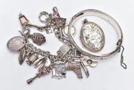 A SELECTION OF SILVER AND WHITE METAL JEWELLERY, to include a silver hinged bangle with scroll