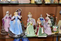 A GROUP OF FIGURINES, comprising a Franklin Mint 'Cinderella's Enchanted Moment' bell shaped snow