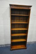 A ROYAL OAK FURNITURE COMPANY, BALMORAL COLLECCTION, A PERIOD STYLE OAK OPEN BOOKCASE, with five