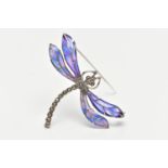 A WHITE METAL PLIQUE A JOUR BROOCH, in the form of a dragonfly, the body set with marcasite,
