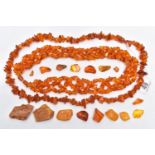 TWO COPAL AMBER NECKLACES, two large necklaces comprised of polished and rough copal amber beads,