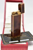 A BOXED 'LES MUST DE CARTIER' LIGHTER, brown laquear gold plated lighter, with signed 'Cartier'