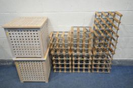 SEVEN VARIOUS SIZED WINE RACKS, and a pair of beech linen baskets (9)