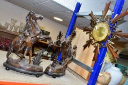 A PAIR OF SPELTER 'MARLEY HORSES' FIGURINES, supported on wooden plinths, cold-painted brown, height