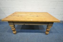 A PINE COFFEE TABLE, on turned legs, length 123cm x depth 74cm x height 49cm (condition:-the top