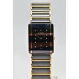 A RADO BLACK CERAMIC 'DIASTAR' QUARTZ WRISTWATCH WITH DATE, the black dial with gold tone hourly