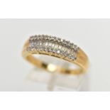 AN 18CT YELLOW GOLD DIAMOND HALF ETERNITY RING, designed with a central row of baguette cut