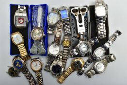 A PLATSIC TUB OF WRISTWATCHES, untested used conditions, mostly gents quartz watches, with names