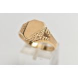 A 9CT GOLD SIGNET RING, yellow gold signet ring, engraved with a scrolling design and textured