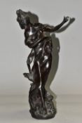 A BRONZE FEMALE FIGURE, standing on a naturalistic base, height 35cm (1) (Condition report: hole