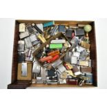 A BOX LID OF ASSORTED LIGHTERS, used conditions, spares and repairs, names to include 'Ronson,