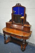 A VICTORIAN FLAME MAHOGANY DUCHESS DRESSING TABLE, with a single swing mirror, flanked by six