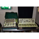 TWO CASED 20TH CENTURY ACCORDIONS, comprising a Vissimio accordion with original fitted case