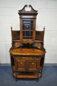 A LATE VICTORIAN WALNUT CORNER CABINET, made up of two sections with an arrangement of doors,