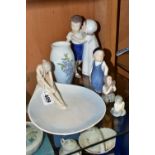 A GROUP OF BING & GRONDAHL AND ROYAL COPENHAGEN PORCELAIN, comprising a Bing and Grondahl figural