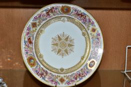 A SEVRES PORCELAIN DESSERT PLATE, from the Royal Hunting Service, featuring a scrolling border