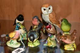 NINE BESWICK BIRDS, comprising Owl model no 2026, Pheasant First Version no 767A, Stonechat 2274,
