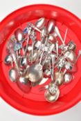 A BOX OF SILVER AND WHITE METAL TEASPOONS, an assortment of souvenir and commemorative spoons, a