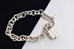 A 'TIFFANY & CO' BRACELET WITH PADLOCK CLASP, curb link bracelet fitted with a circular tag