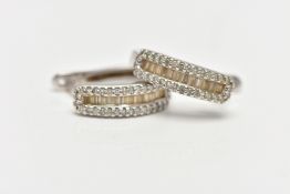 A PAIR OF 9CT WHITE GOLD DIAMOND SET EARRINGS, each of a half hoop, to the center is a row of