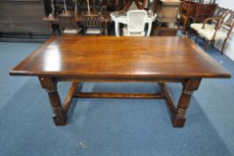 A ROYAL OAK FURNITURE COMPANY, BALMORAL COLLECCTION, A PERIOD STYLE OAK REFECTORY TABLE, on turned