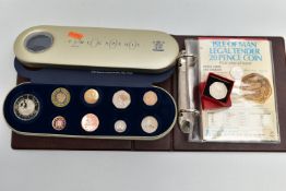 A COLLECTORS ALBUM CONTAINING ISLE OF MAN COINAGE, to include The Viking Arms and Armour sterling