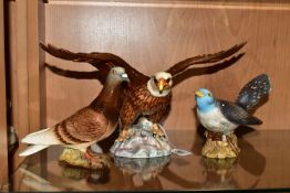 THREE BESWICK BIRD FIGURES, comprising Bald Eagle model no 1018, height 18cm (chips and repair to