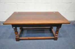 A TITCHMARSH AND GOODWIN STYLE RETANGULAR OAK COFFEE TABLE, on turned legs, untied by box