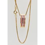 AN 18CT YELLOW GOLD PENDANT NECKLACE, the pendant of a curved rectangular form, set with two rows of