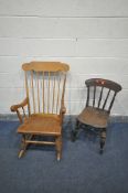A MODERN BEECH SPINDLED ROCKING CHAIR, and an elm kitchen chair (condition:-kitchen chair dusty