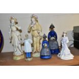 A GROUP OF FIGURINES, comprising two Swedish Jie Gantofta figural posy vases, in the form of