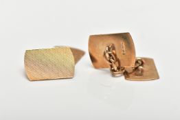 A PAIR OF 9CT GOLD CUFFLINKS, each of a curved rectangular form, with an engine turned pattern and
