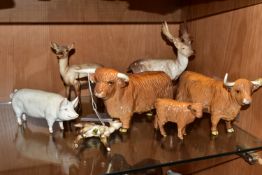 A GROUP OF BESWICK ANIMALS, comprising Highland Bull model no 2008, Highland Cow model no 1740 and