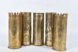 FIVE WWI ERA TRENCH ART SHELL CASES, to include two that have been hand beaten with a flower type