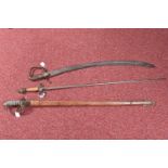 THREE VICTORIAN AND POSSIBLY LATER SWORDS, one is in a leather scabbard with an ornately decorated