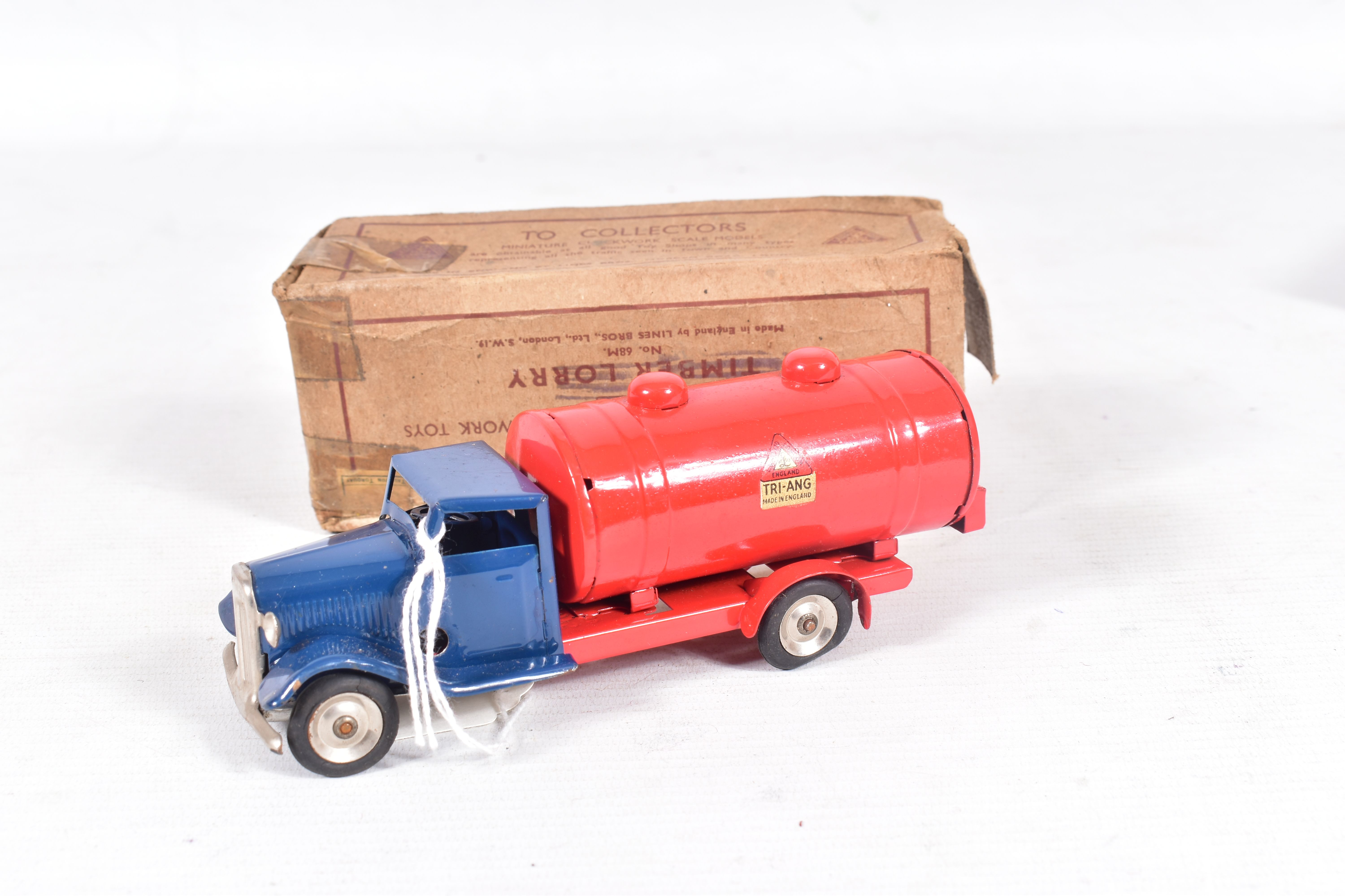 A BOXED TRI-ANG MINIC CLOCKWORK PETROL TANK LORRY, No.15M, complete with damaged Tri-ang Minic