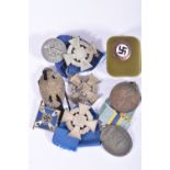 A COLLECTION OF GERMAN WWII ERA MEDALS AND BADGES, to include a West Wall medal in its original